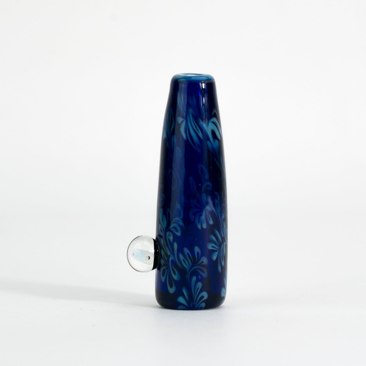 blue glass chillum for storage with floral