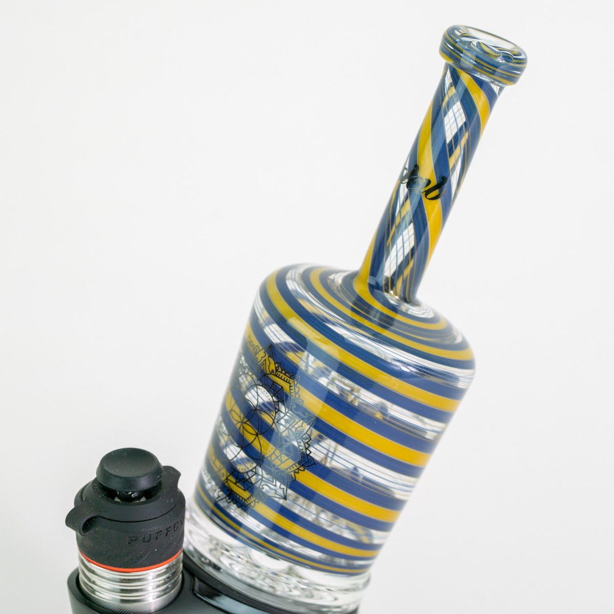 Closeup of glass attachment on Puffco device with white background