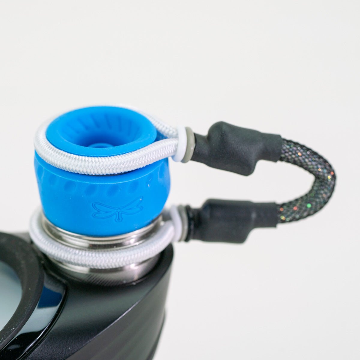 Blue and black attachment closeup on white background