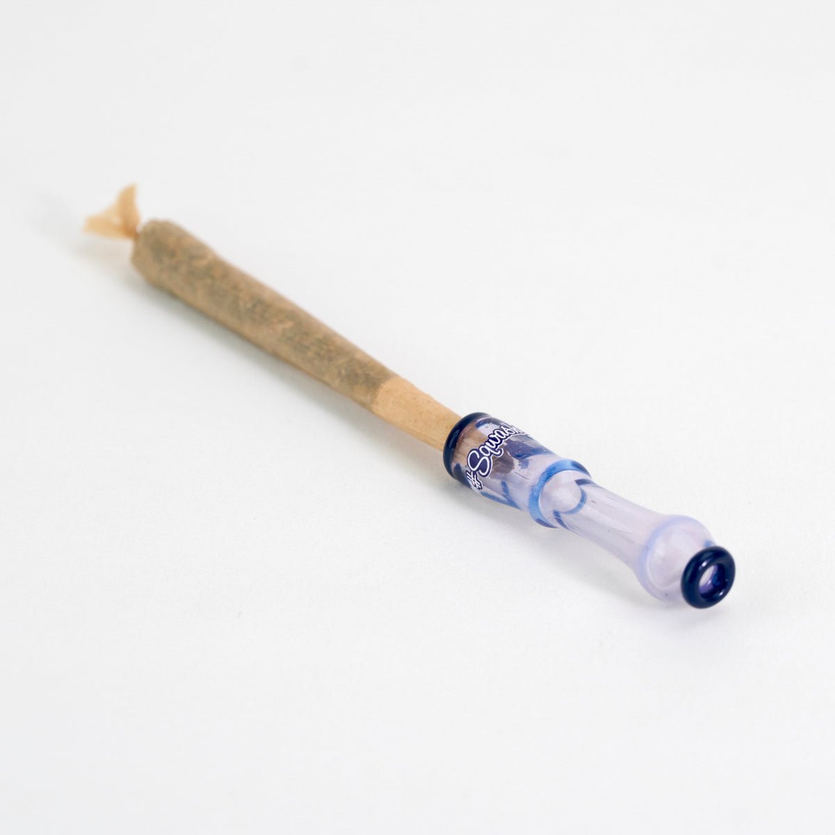 Cannabis joint in joint holder purple laid flat