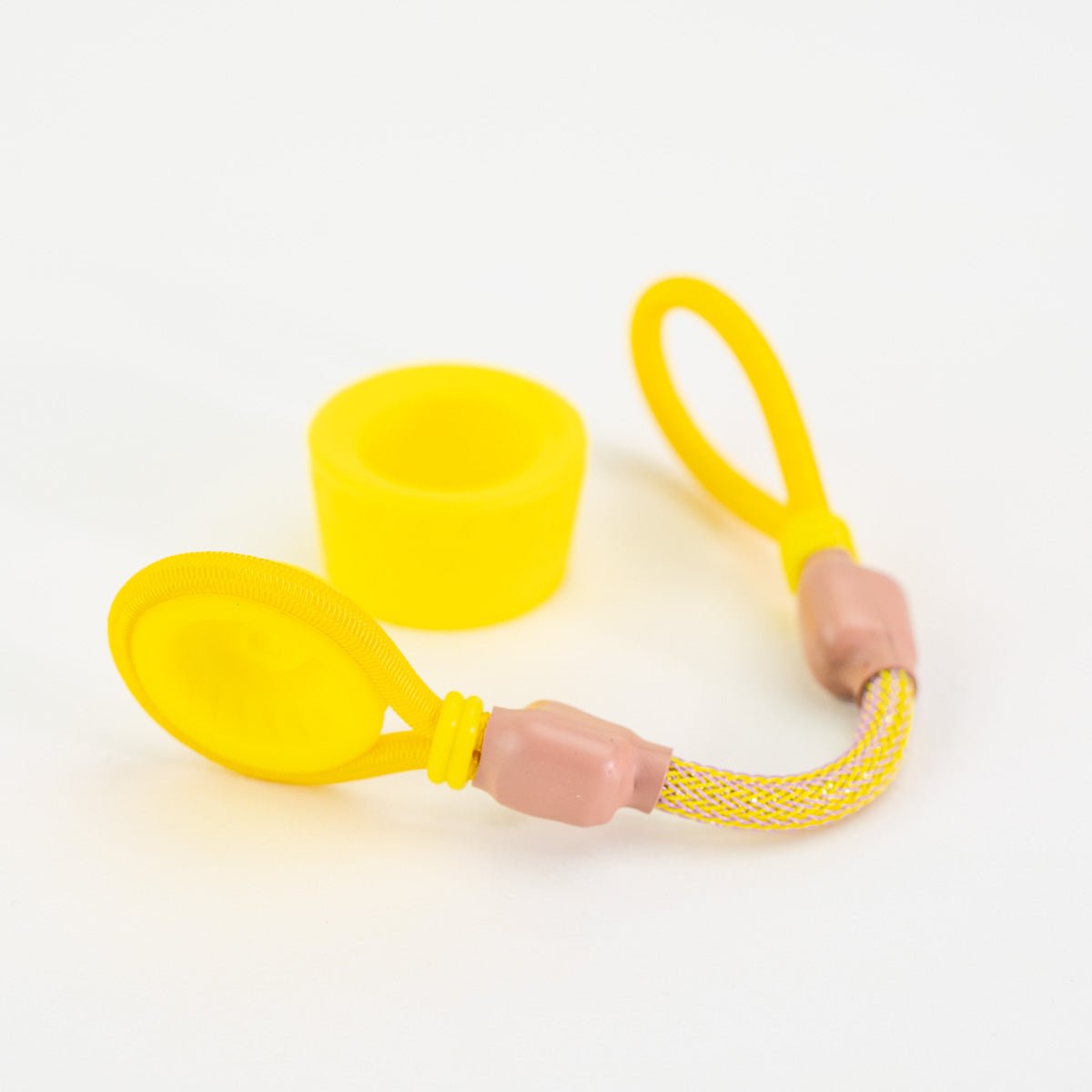 Yellow vaping device accessory on white background