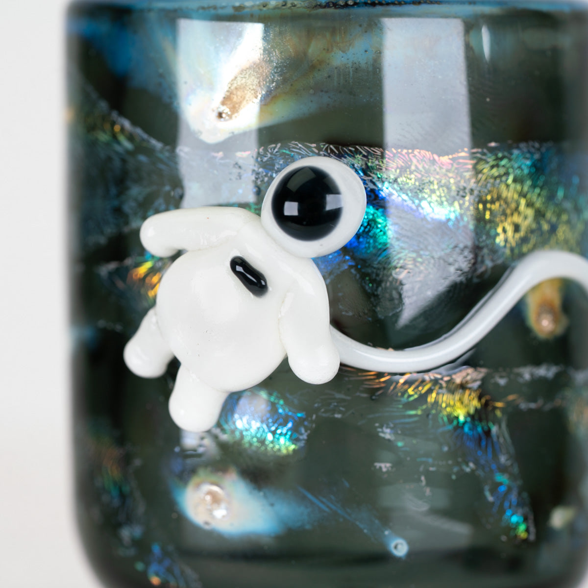 Front view of the Across the Universe Proxy Core Attachment with sculpted white character