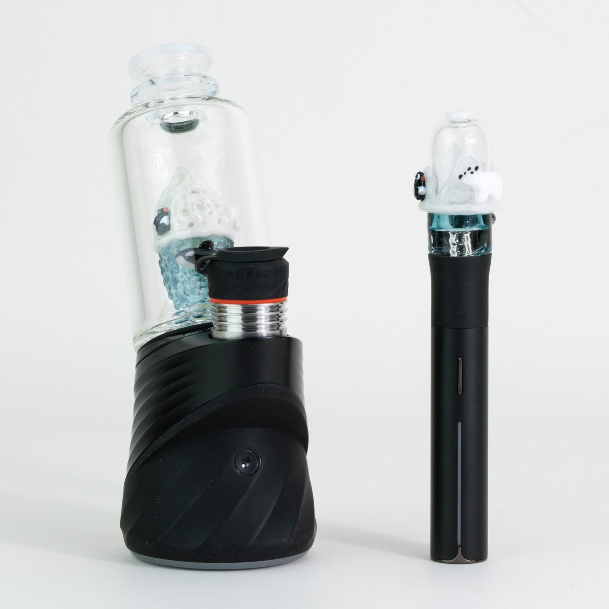 Avenge the Arctic Puffco Peak glass attachment and matching Pivot mouthpiece displayed on Puffco device