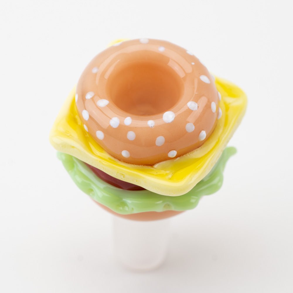 Burger glass bowl piece with sesame bun, lettuce, tomato, and cheese details