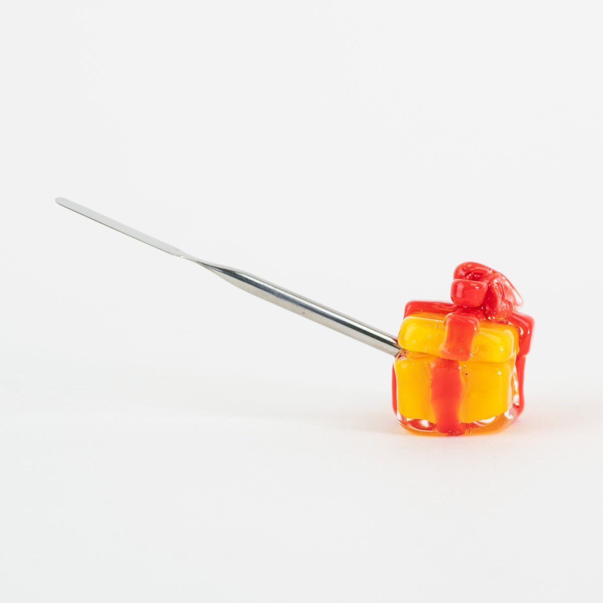 Yellow present dabber with red bow by Empire Smokes