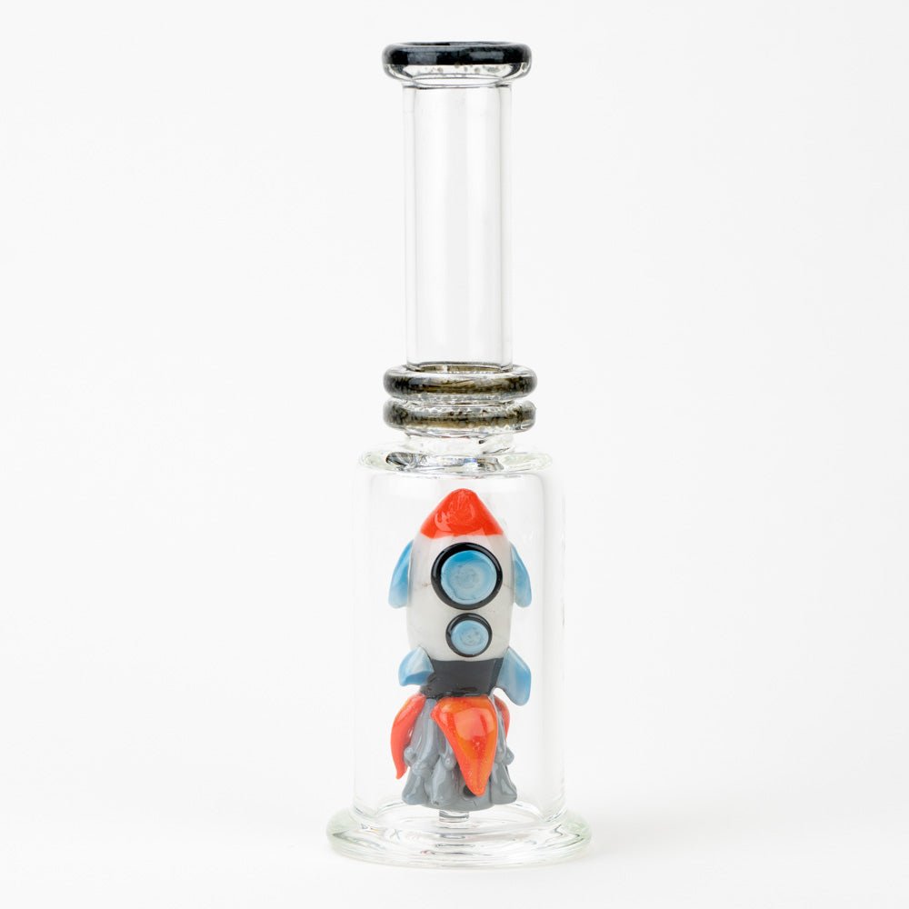 Collectible rocket mini tube rig with detailed figurine work and colorful accents