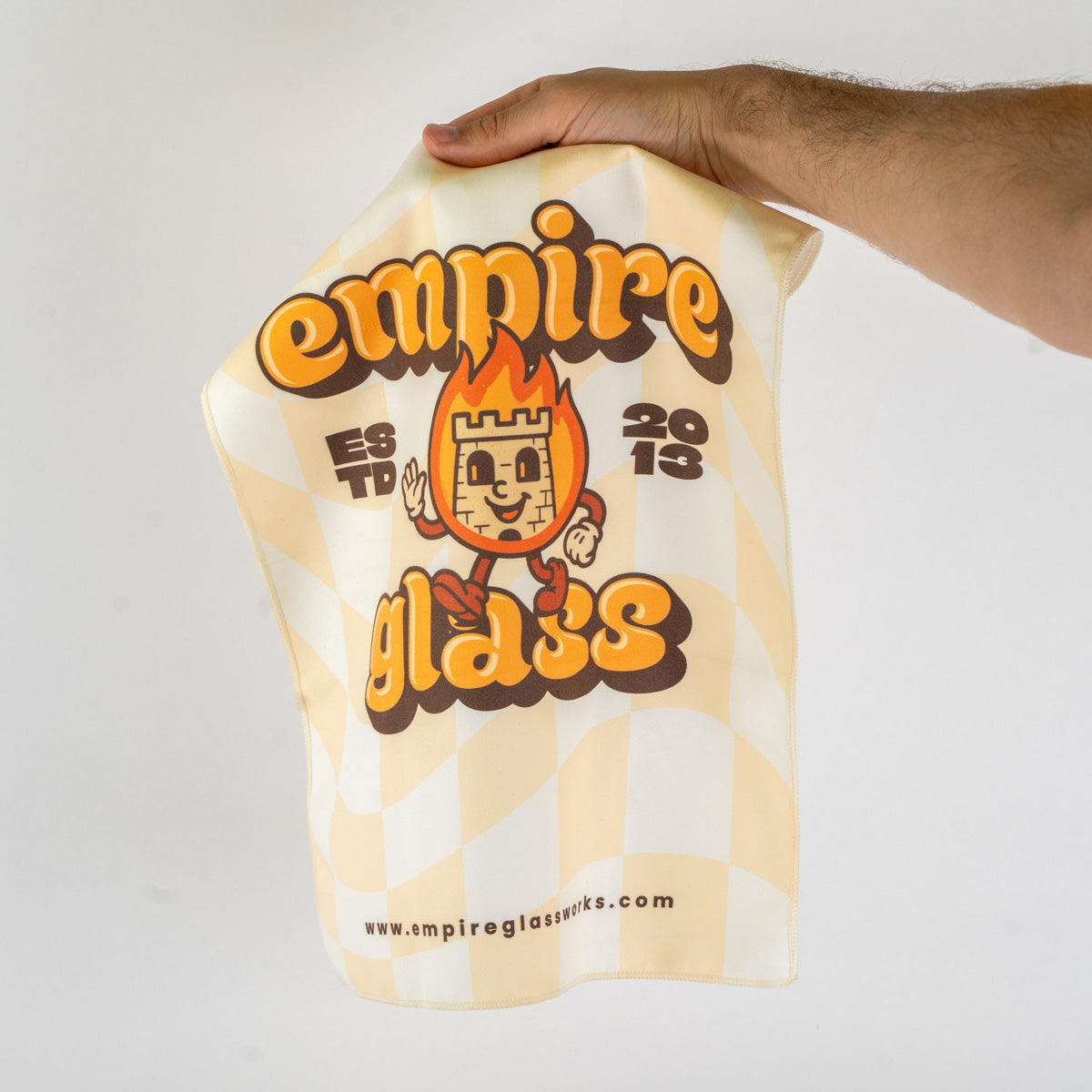 Cream checkered Empire dab rag with wavy background and bold graphic print