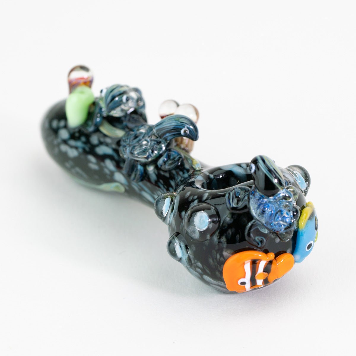 a decorative glass pipe with sea animals