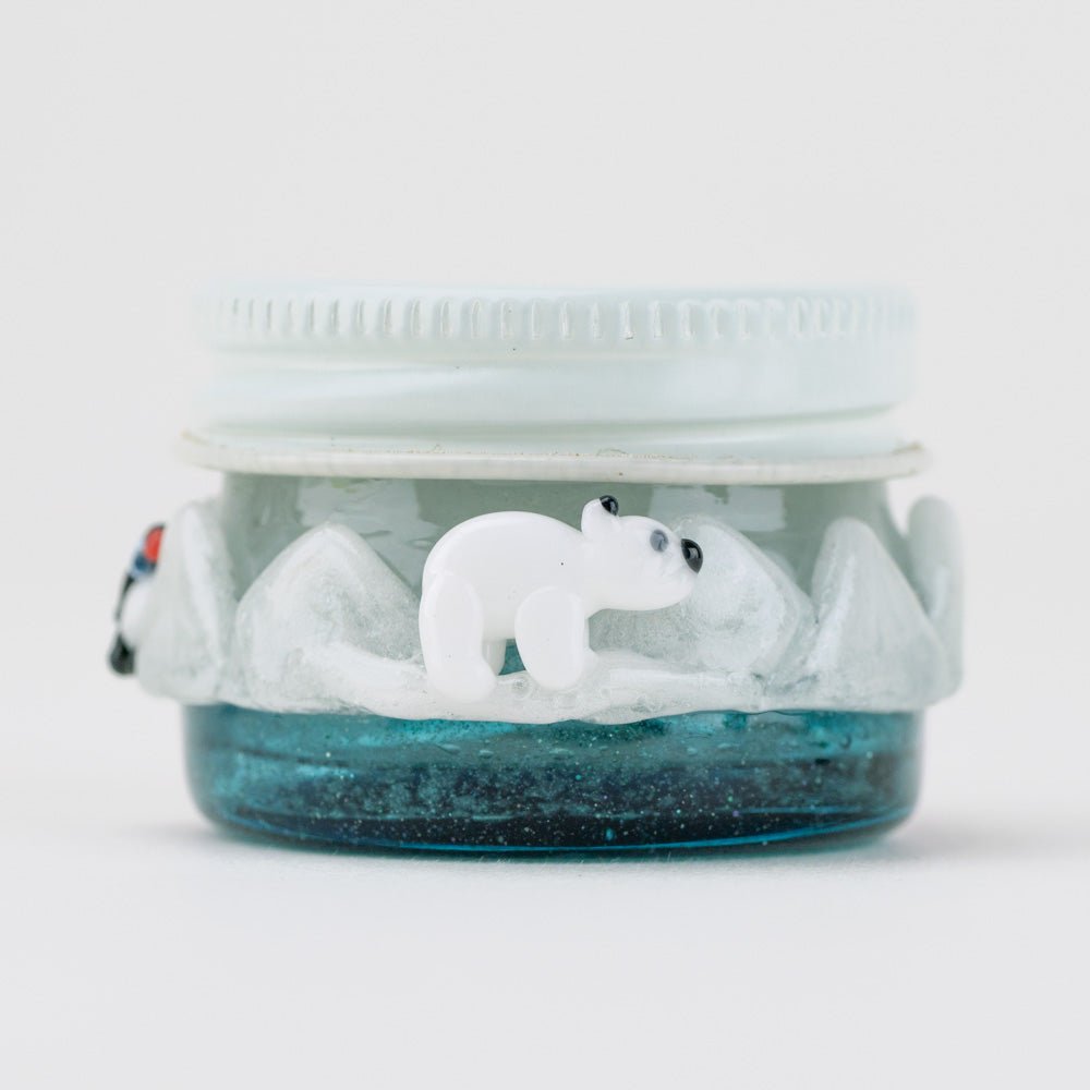 Empire Glassworks Arctic Terp Jar featuring penguin, polar bear, and orca in a snowy glass design.