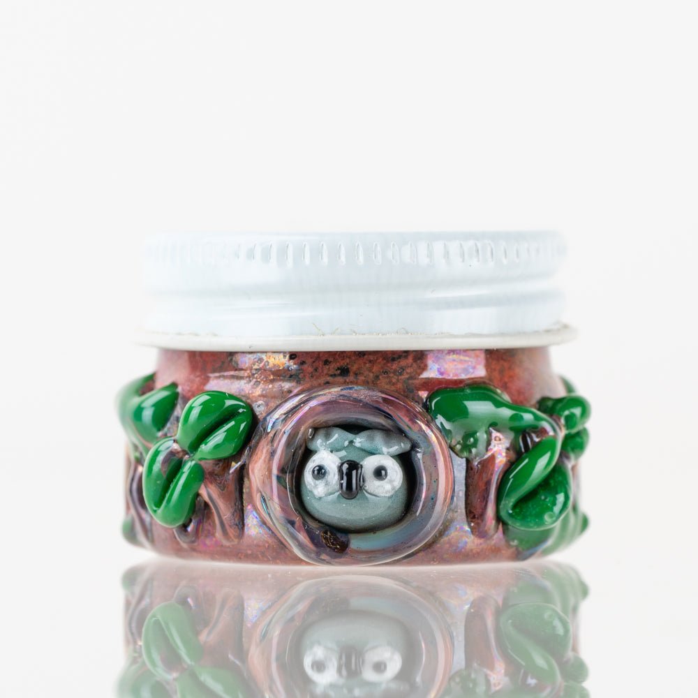 Empire Glassworks forest dab jar with handcrafted glass details and covered storage