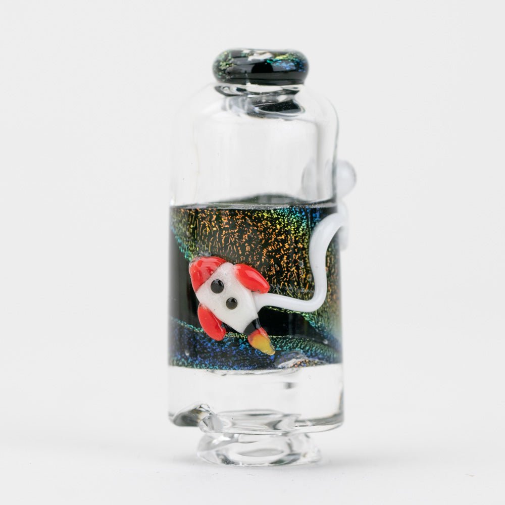 Empire Glassworks Across the Universe Puffco Pivot glass mouth piece featuring rocket ship and astronaut.