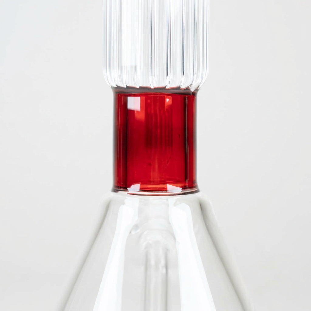 Detailed view of the rich ruby-red glass neck accent beneath the signature vertical ribbing of the Classics Beaker