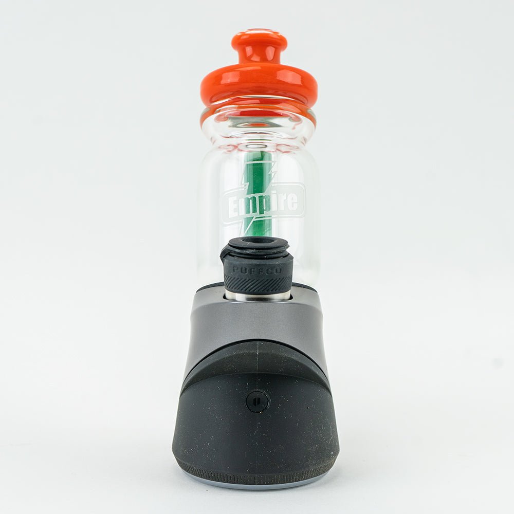 Empire Glassworks squeeze bottle Puffco glass attachment shown from the front on a Puffco Peak device