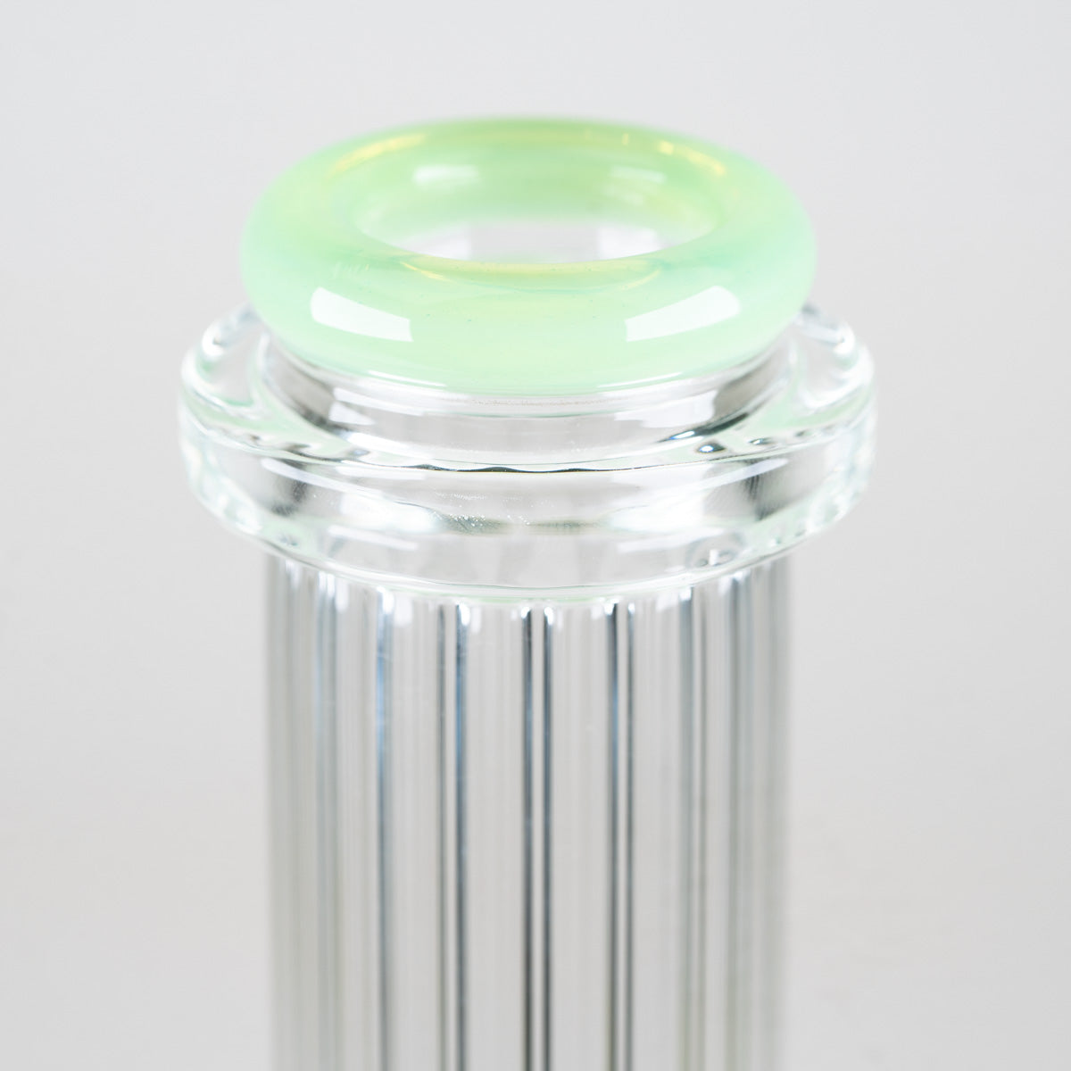 Close-up of the sculpted mint-green comfort rim mouthpiece on the Empire Glassworks Classics Julep Beaker Bong