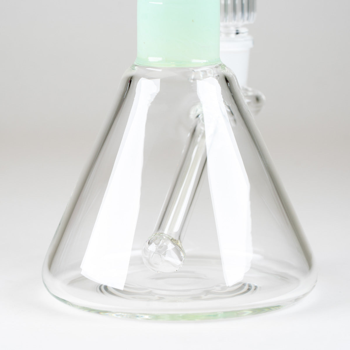 Interior view of the permanently integrated glass downstem inside the Julep Signature Beaker's clear borosilicate base