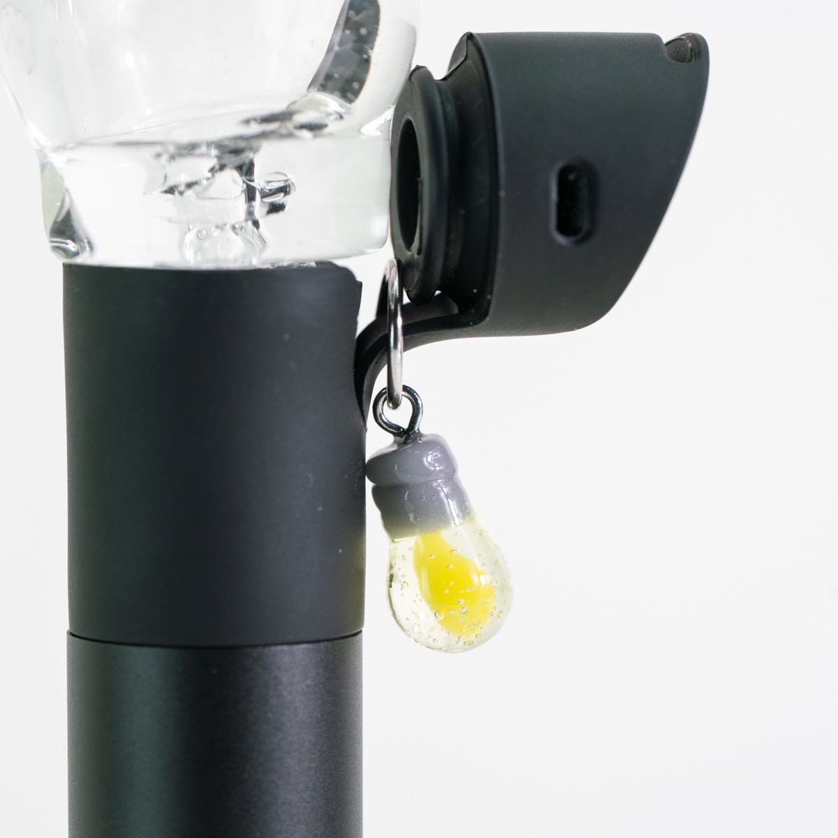 Light bulb glass Puffco charm with a playful creative design