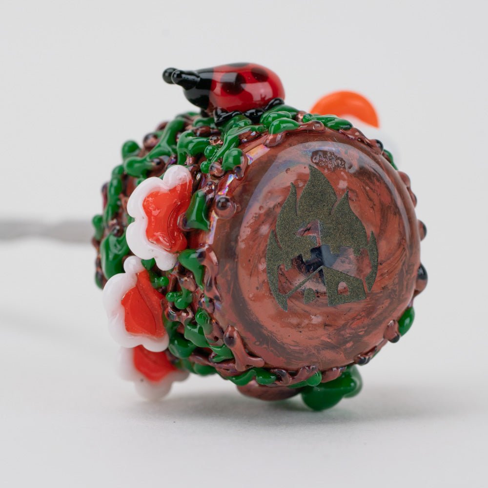 Mushroom glass dabber accessory with forest floor design and ladybug accent