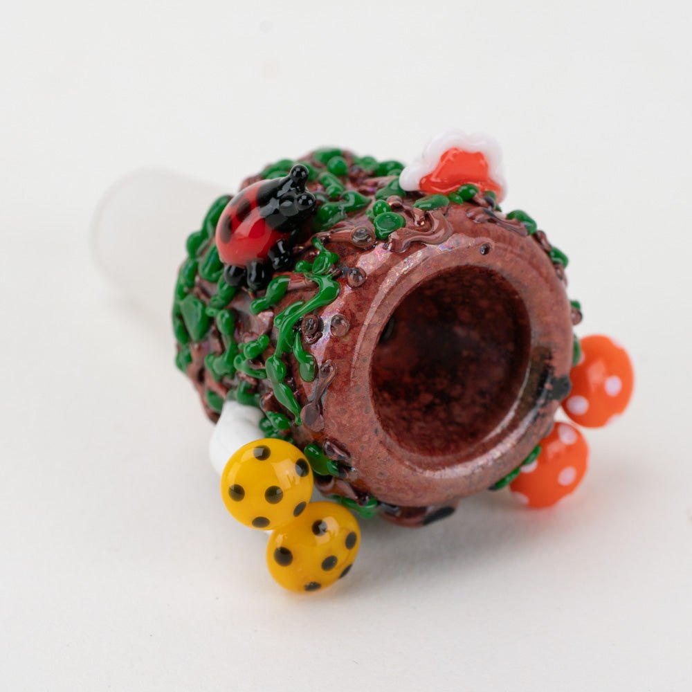 Glass bowl decorated with mushrooms, vines, and a colorful ladybug