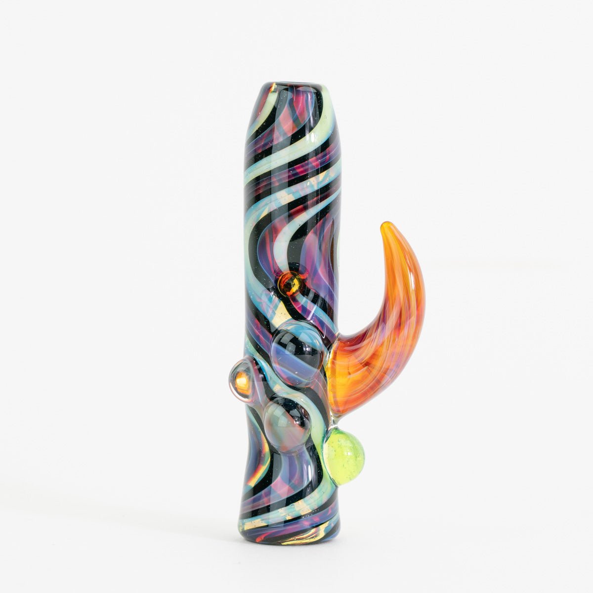 Oracles Chamber chillum held in hand showing size and sculptural form