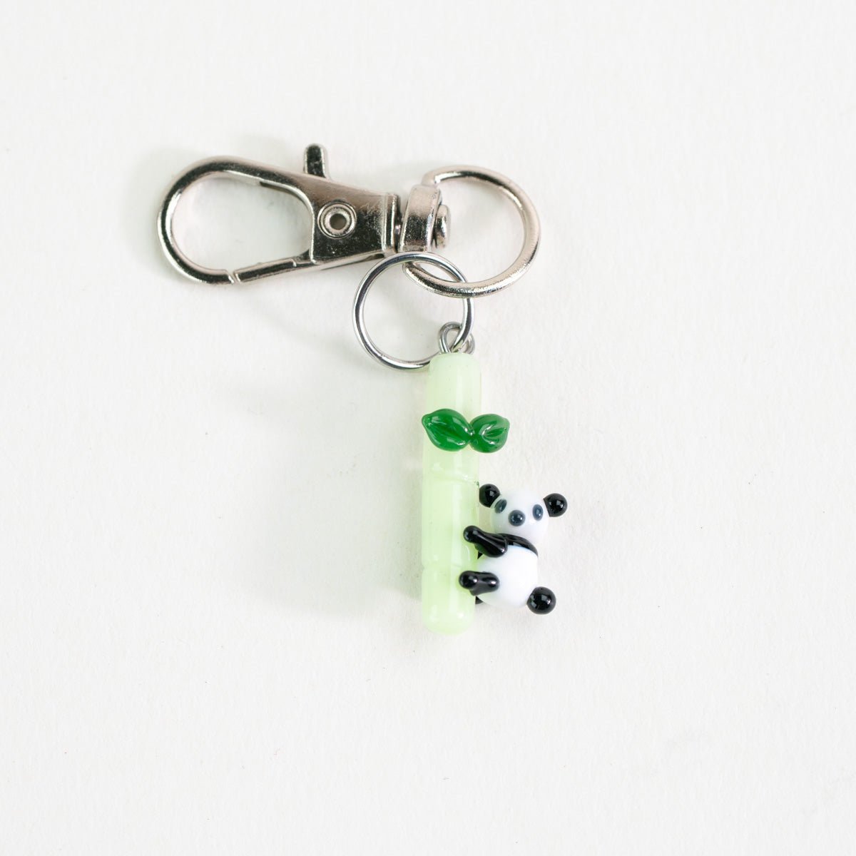 Glass Puffco charm featuring a playful panda design for setup styling