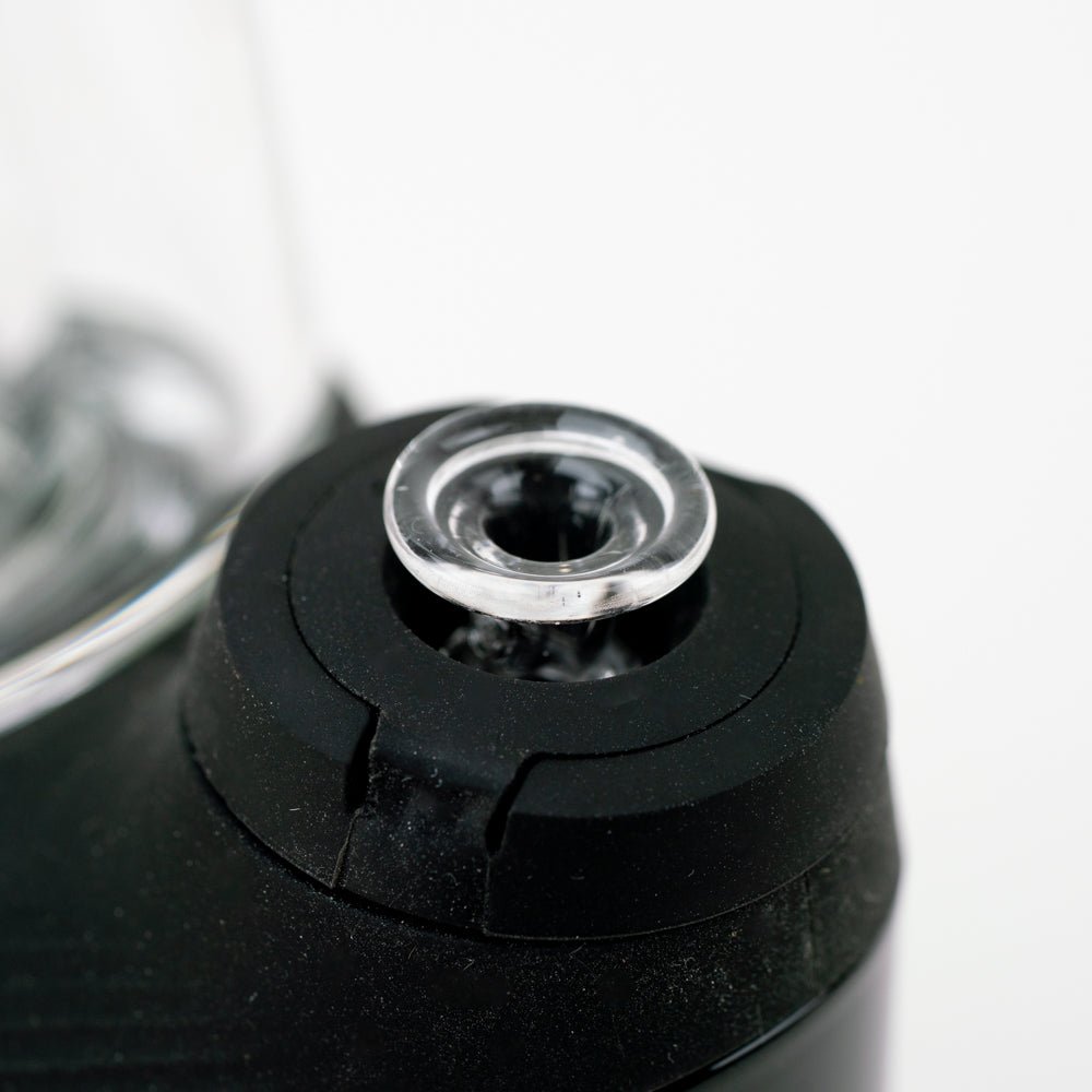 Pink UV joystick cap shown with a Puffco New Peak device
