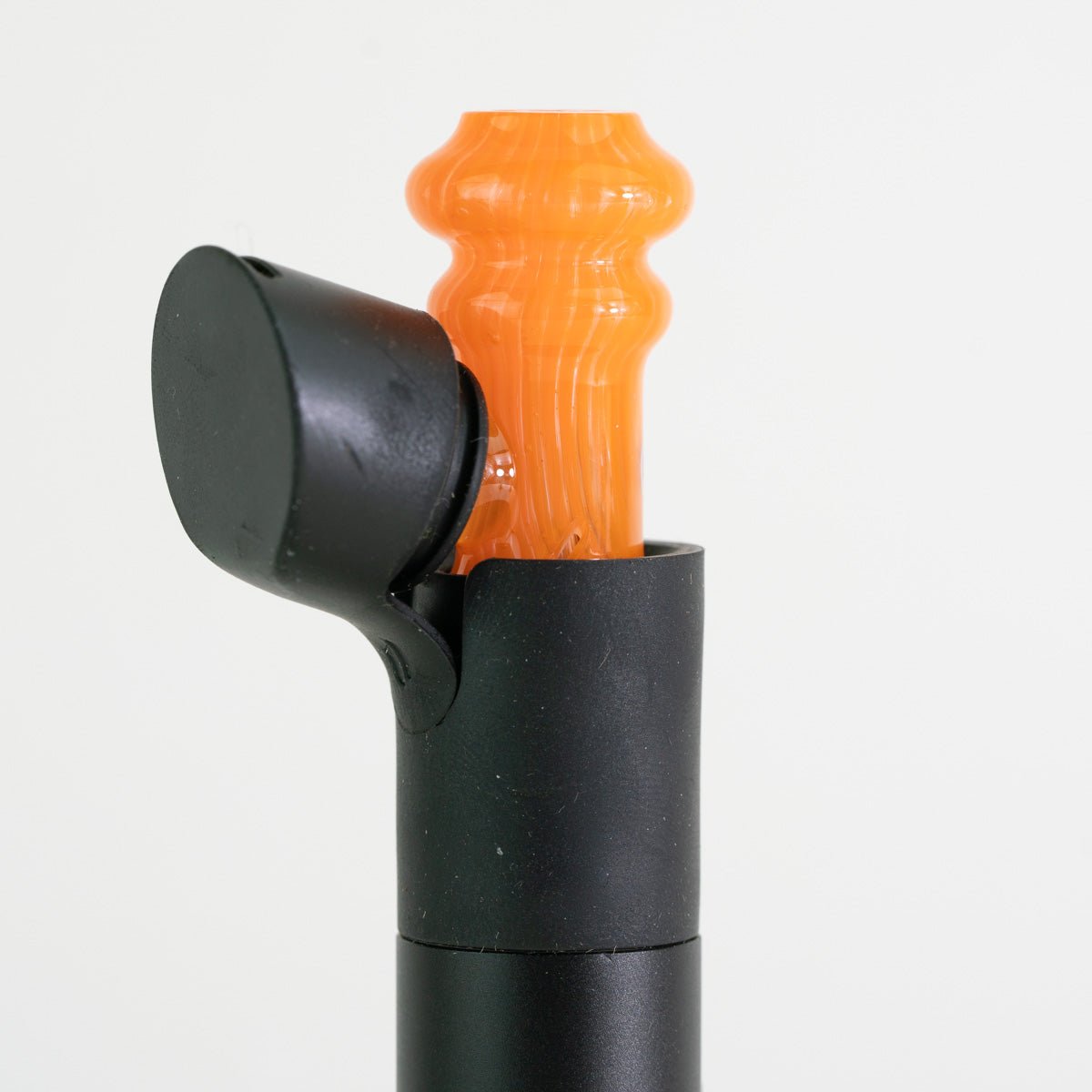 Orange honeycomb glass plume attachment installed on pivot