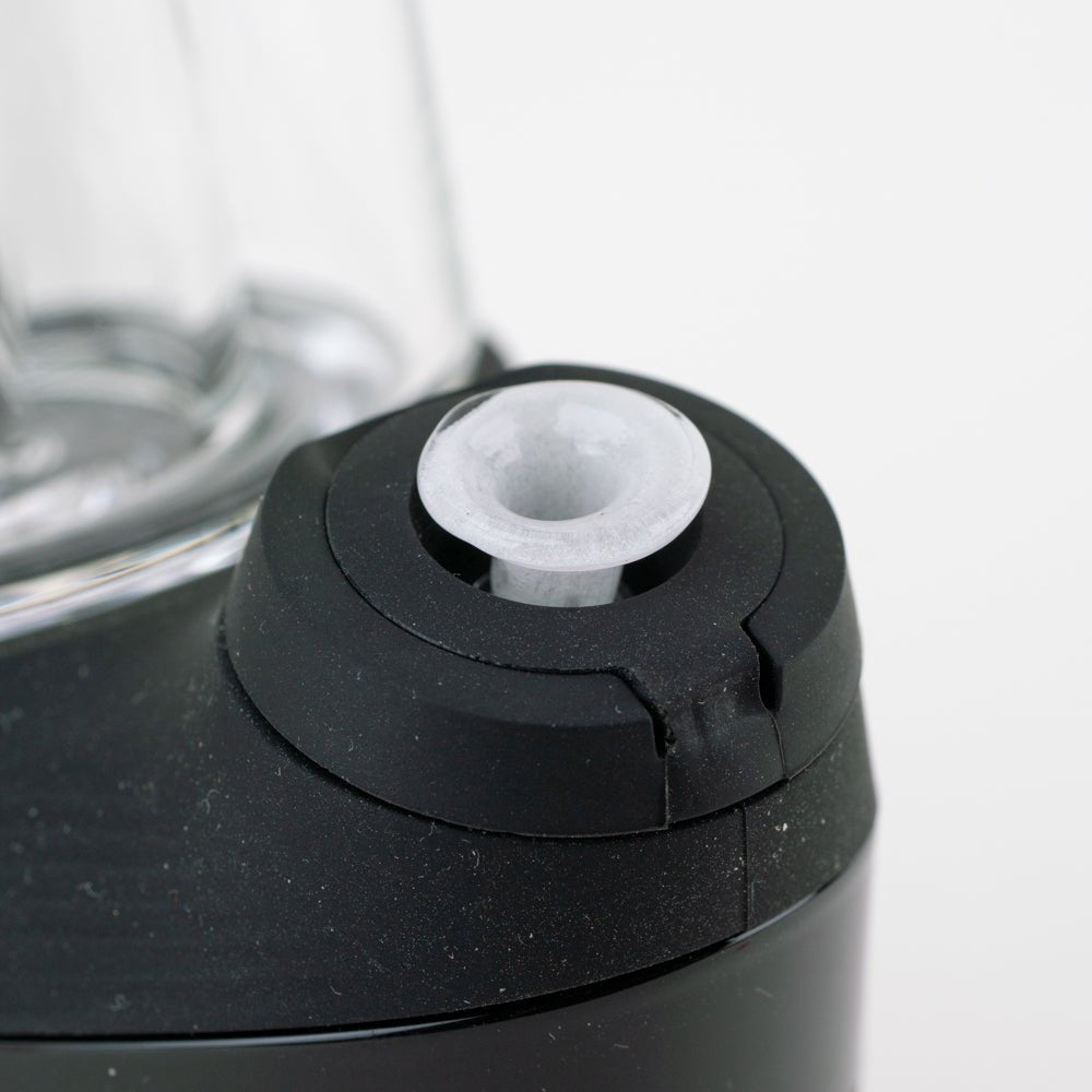 Glow joystick cap displayed with a Puffco New Peak device