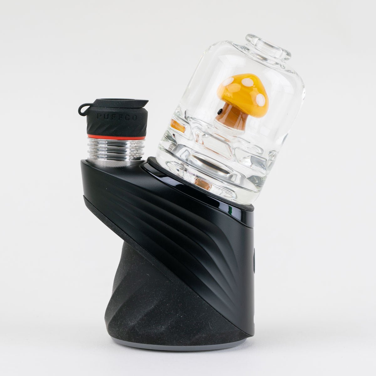 Puffco Peak Pro glass dry top with a yellow mushroom design inside clear glass installed on a black Puffco Peak Pro device