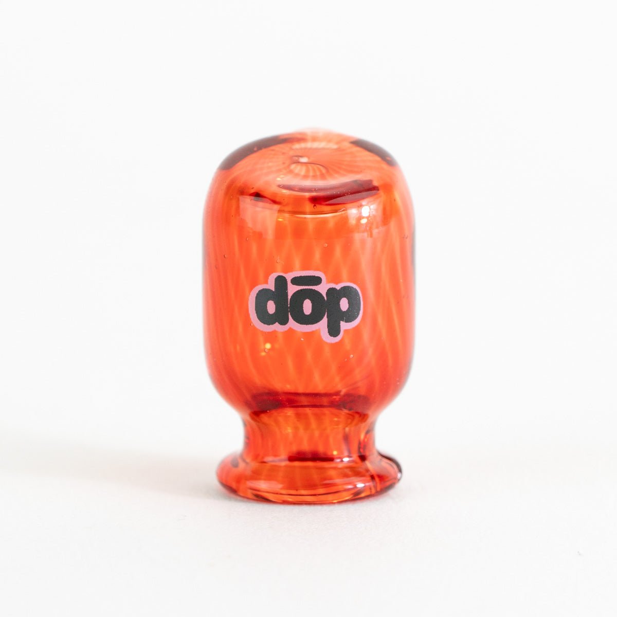 Profile view of red glass pivot side piece