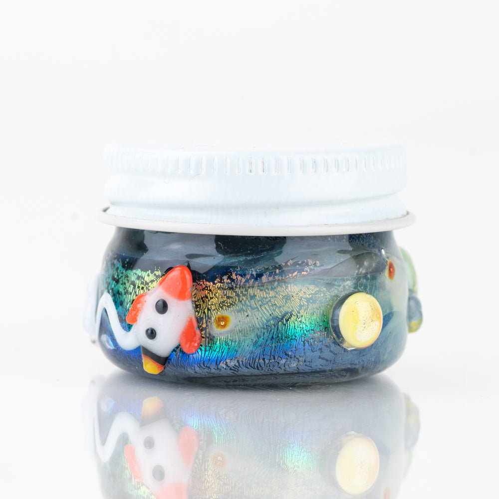 Glass concentrate jar with rocket ship detail and space inspired design
