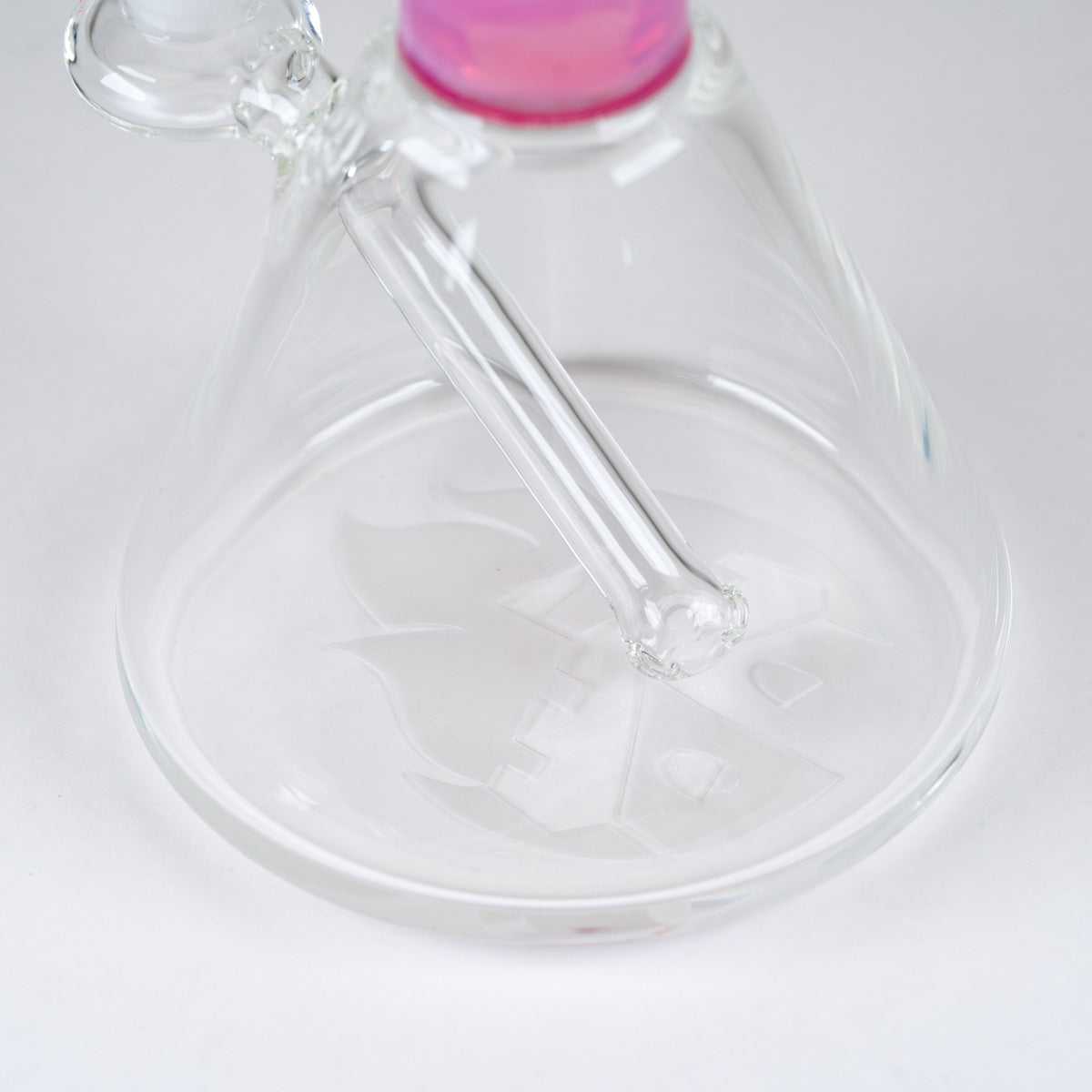 Interior view of the permanently integrated glass downstem inside the clear borosilicate base of the Rosaline Signature Beaker