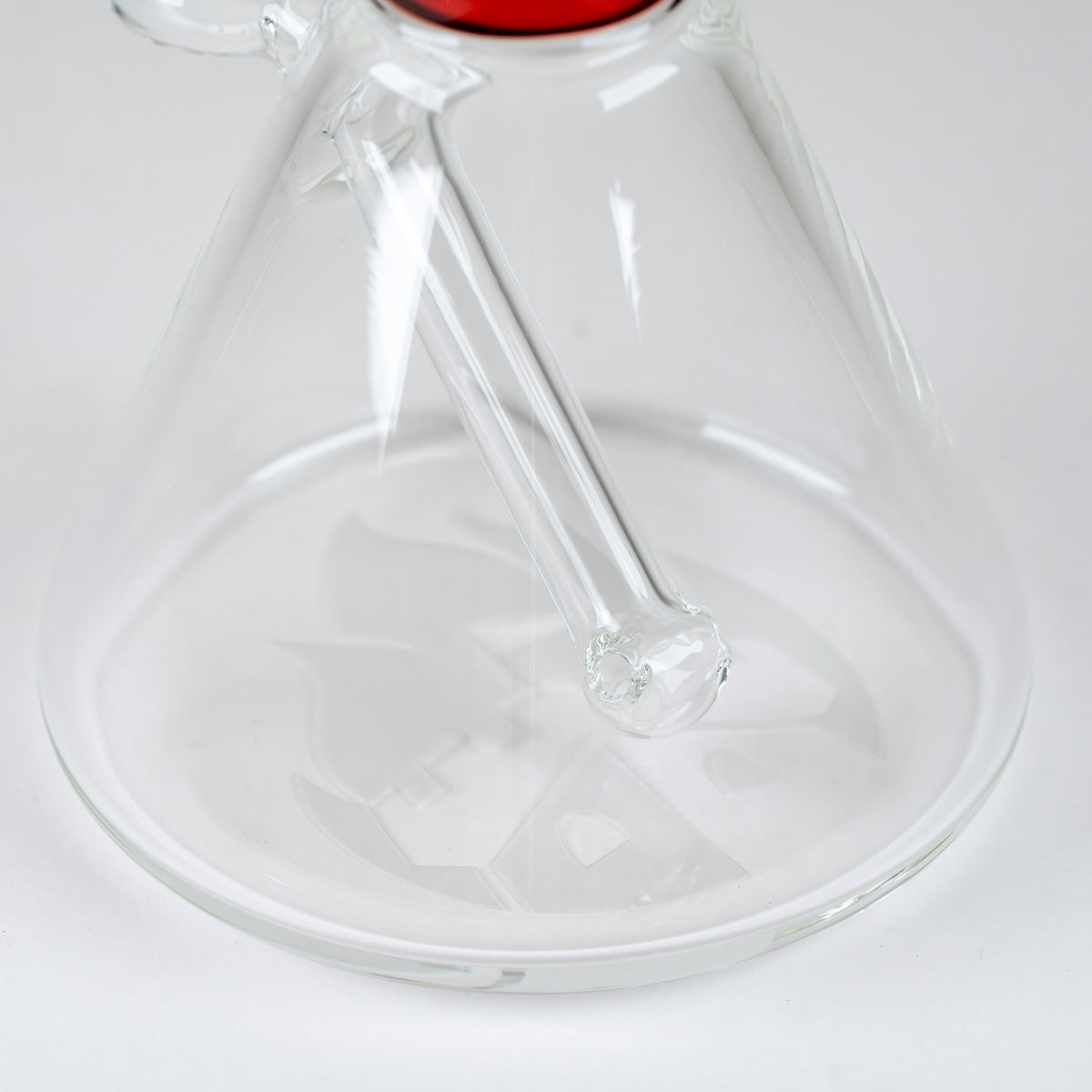 Interior view of the permanently integrated glass downstem inside the Ruby Signature Beaker's clear borosilicate base