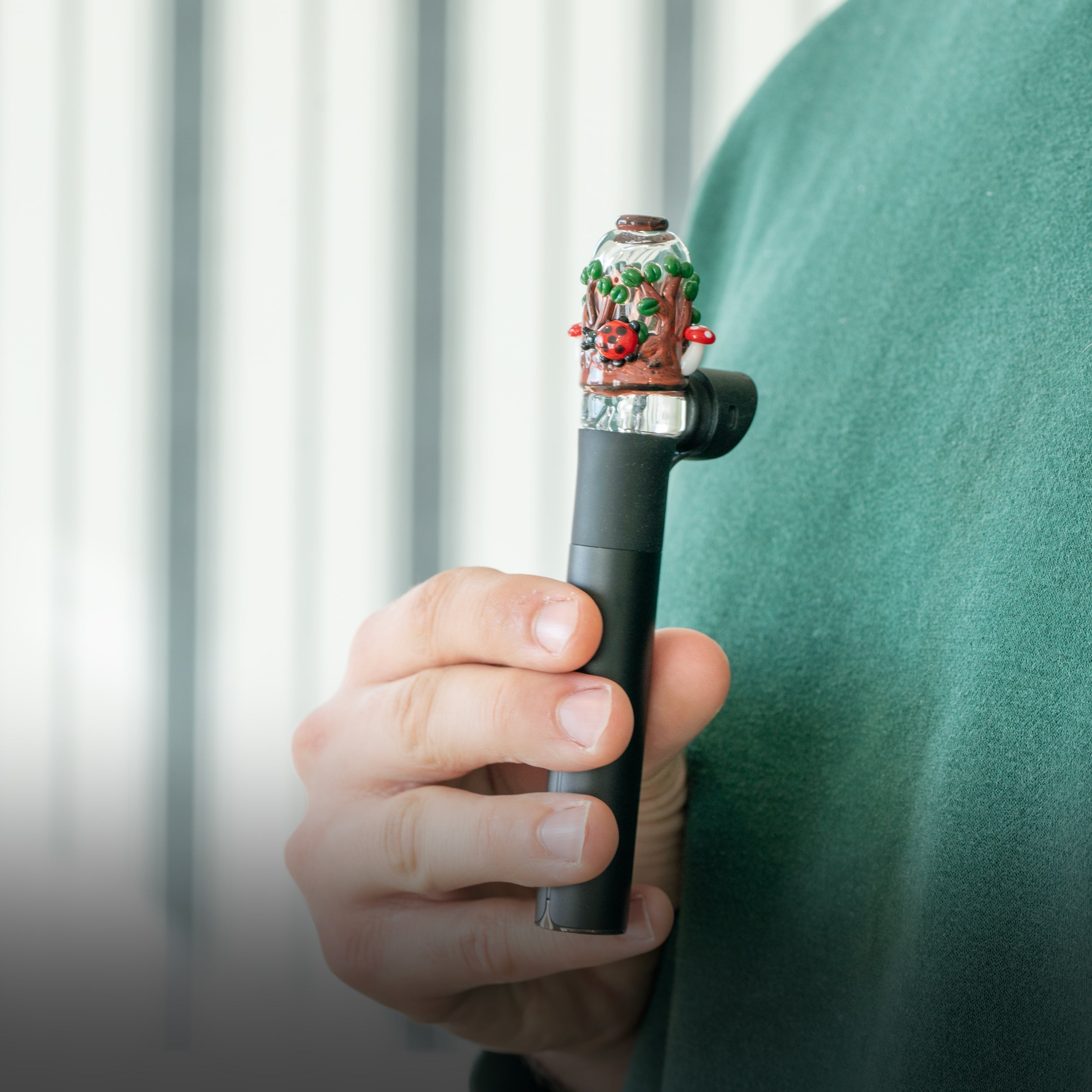 Puffco pivot device with an Empire Glassworks glass pivot mouthpiece