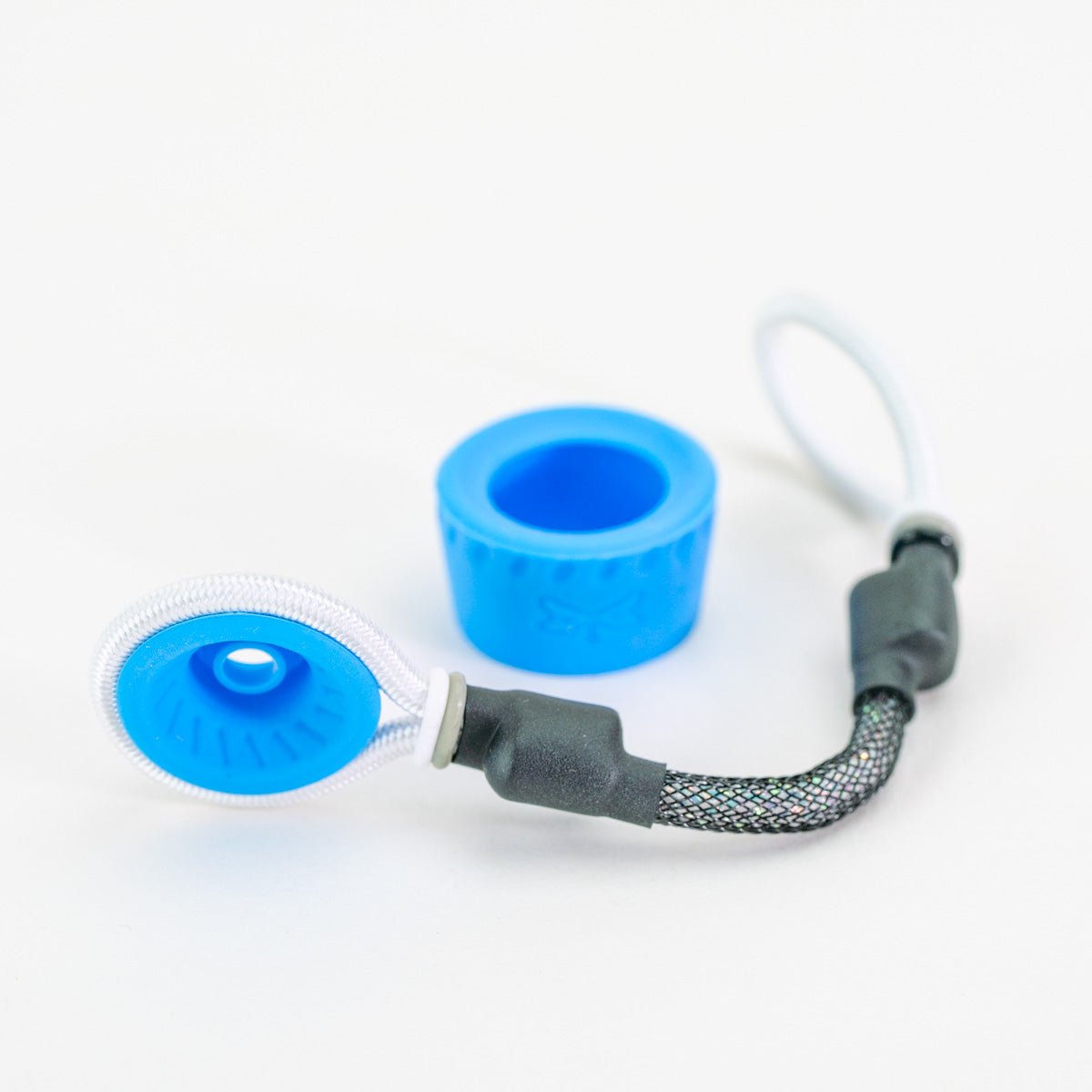 Blue and black tuff tether accessory laying on white background