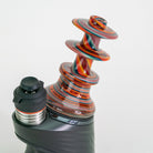 Colorful swirly glass design on Puffco device