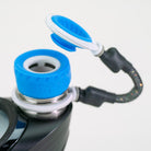 Closeup of blue and black Puffco attachment piece on white background