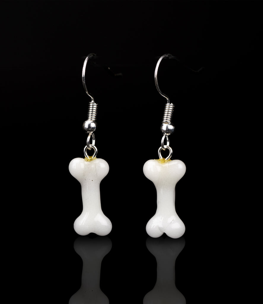 Two dog bone shaped earrings with silver hook Dog Bone Dangle Earrings - Set of Two Empire Smokes