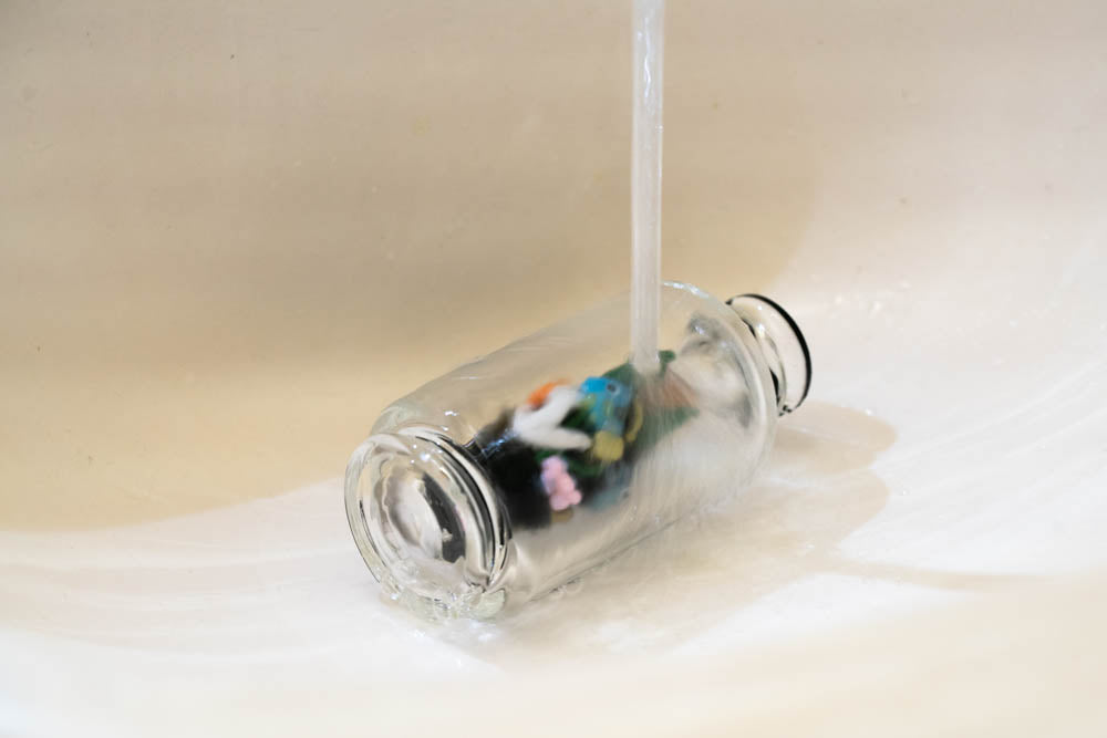 Water running on Empire glass fish attachment