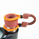 Closeup of tether attachment sitting on Puffco device on white background