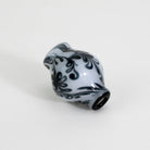 Floral patterned black and white design pivot top piece glass