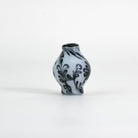 Floral black and white upside down pivot top piece