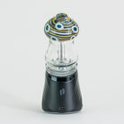 Glass mushroom attachment with blue and white circles on Puffco device