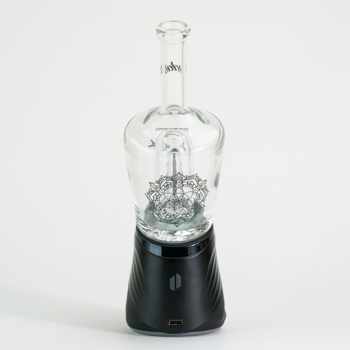 Puffco glass attachment on white background with floral design