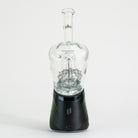Puffco glass attachment on white background with floral design
