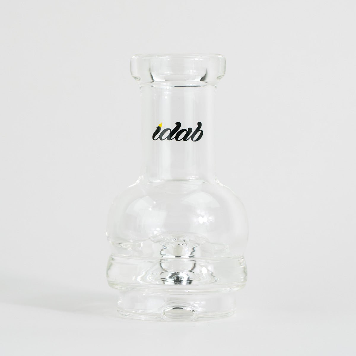 Clear glass bottle attachment with "iDab" text on white background