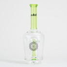 Clear glass bottle with green accent on a white background