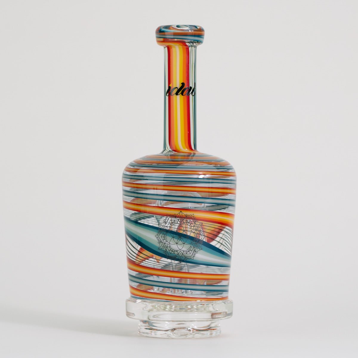 Colorful glass bottle with a pattern on a white background