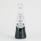 Clear glass bottle for Puffco device on white background