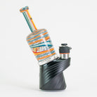 Colorful blue and orange glass bottle on Puffco device