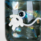 Front view of the Across the Universe Proxy Core Attachment with sculpted white character